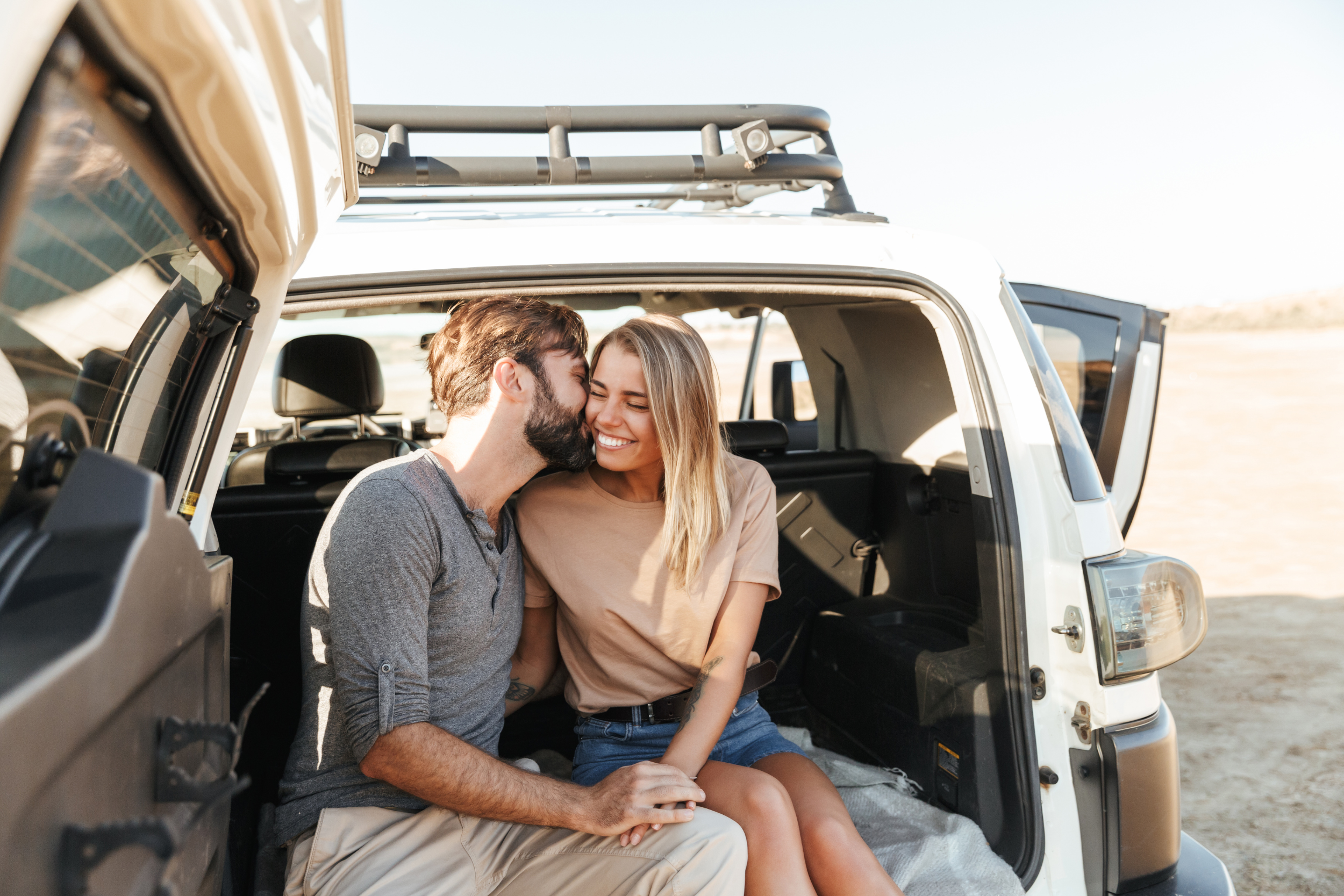 couple sitting in back of car